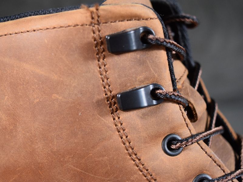 Closeup view of lace speed hooks on The Marin workboots.